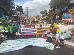 Crowds march on doorstep of COP30 climate summit
