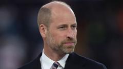 Prince William in a dark suit with white shirt and striped tie