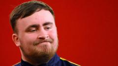 Littler throws nine-darter but 19-match win streak ends