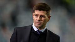 Gerrard cites 'unfinished business' as Rangers wait
