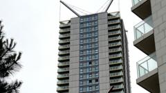 Child among three dead in tower block fall
