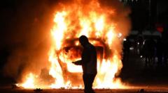 Fireworks and bottles thrown at police as Ballymena violence flares for second night