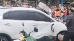 Car driven into crowd outside primary school in China