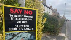 Village 'heart ripped out' by battery site plans