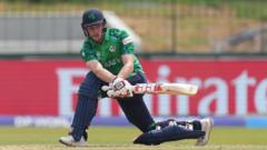 Tucker's 94 keeps Ireland's World Cup hopes alive