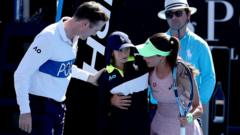 Player helps ball girl after collapse at Australian Open