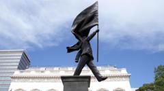 How did Banksy put up a statue in central London?