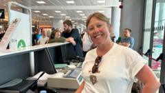 Mum steps in to control crowd at Greek airport
