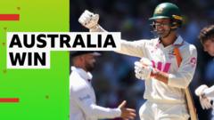 Carey hits four to seal five-wicket win for Australia