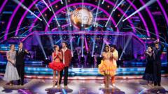 The four Strictly Come Dancing semi-finalists, in dancing costumes, waving and clapping on the dancefloor