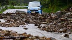 One dead and several missing after 'unprecedented' rains in Japan