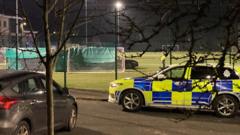 Child dies after being hit by car on sports pitch