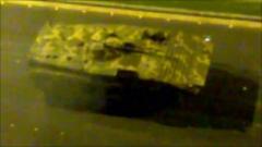 Screengrab of video purportedly showing tanks and armoured vehicles near Homs on evening of 9 May 2011