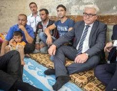 German Foreign Minister Frank-Walter Steinmeier meets Yazidi refugees in Irbil, northern Iraq, 16 August
