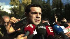 Alexis Tsipras, leader of the Syriza party, talks to reporters outside the parliament building in Athens - 29 December 2014