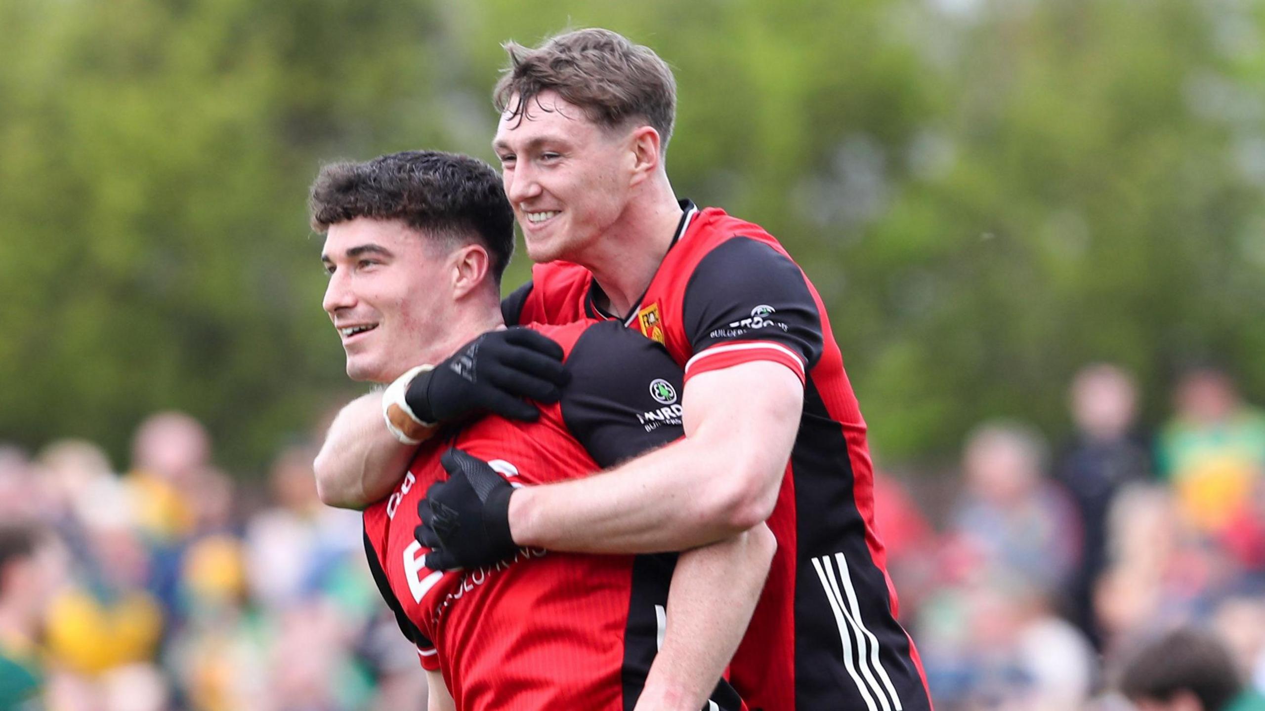 Down's Ryan McEvoy and Daniel Guinness celebrate