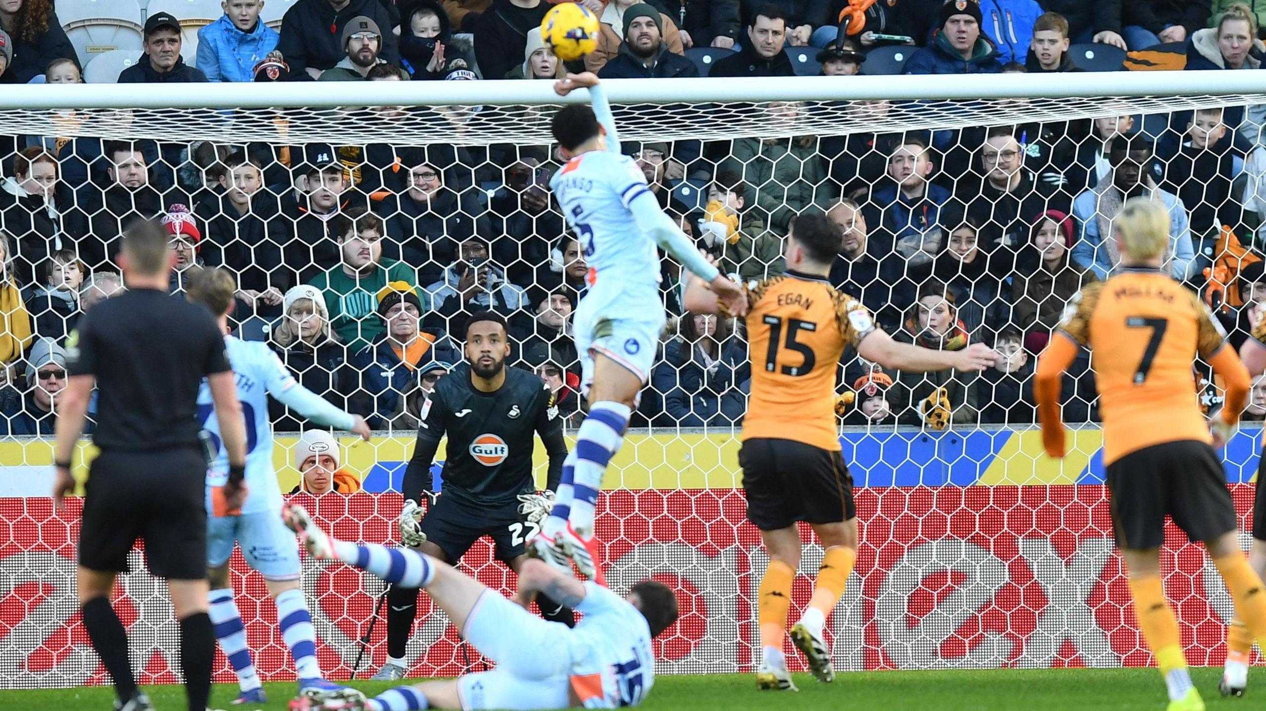 Ben Cabango handles the ball, leading to Hull's penalty
