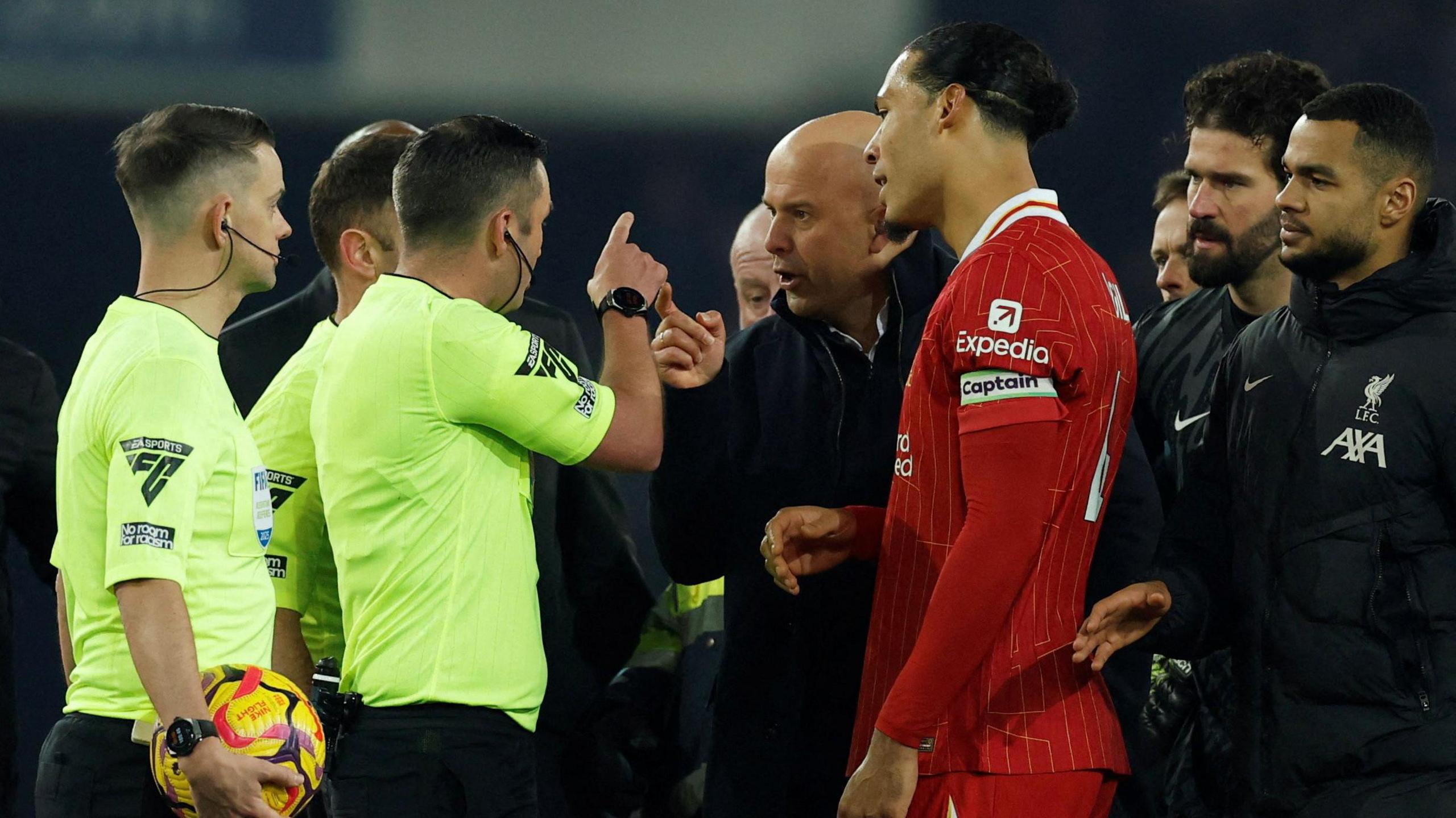 Liverpool boss Arne Slot argues with the officials at Goodison