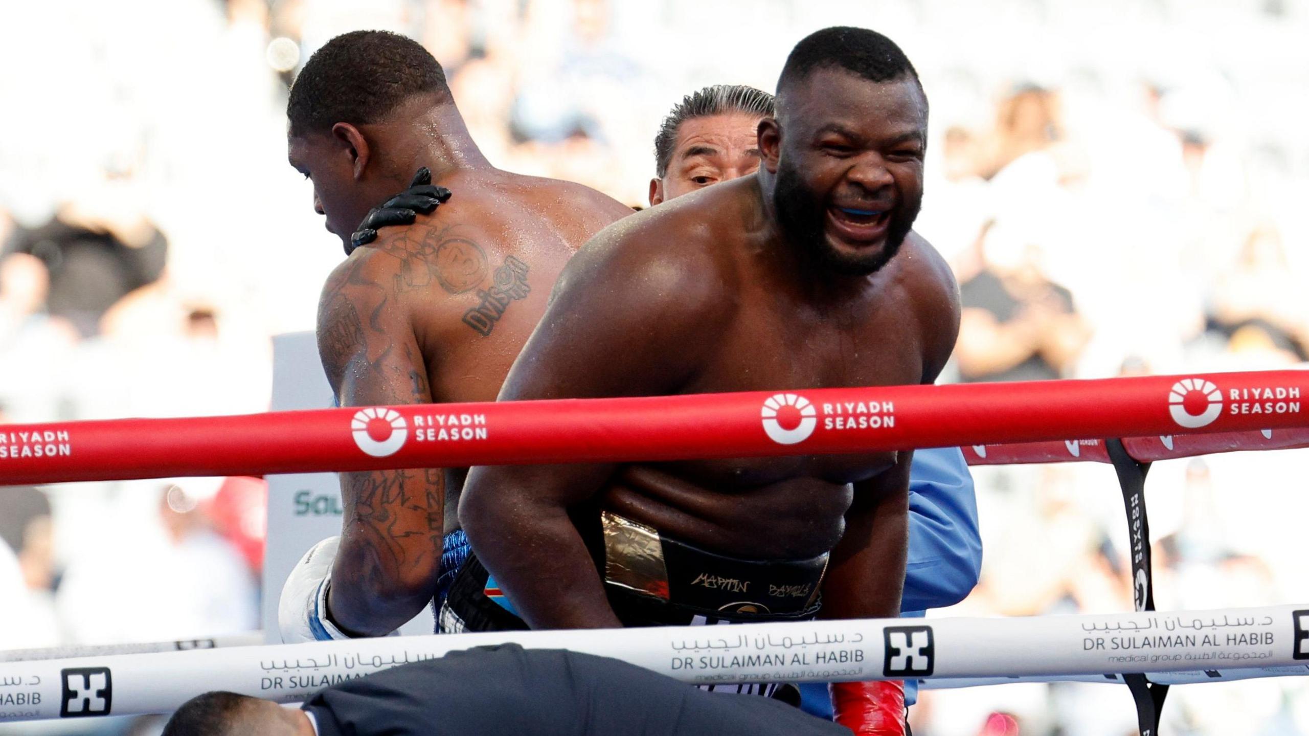 Martin Bakole celebrates