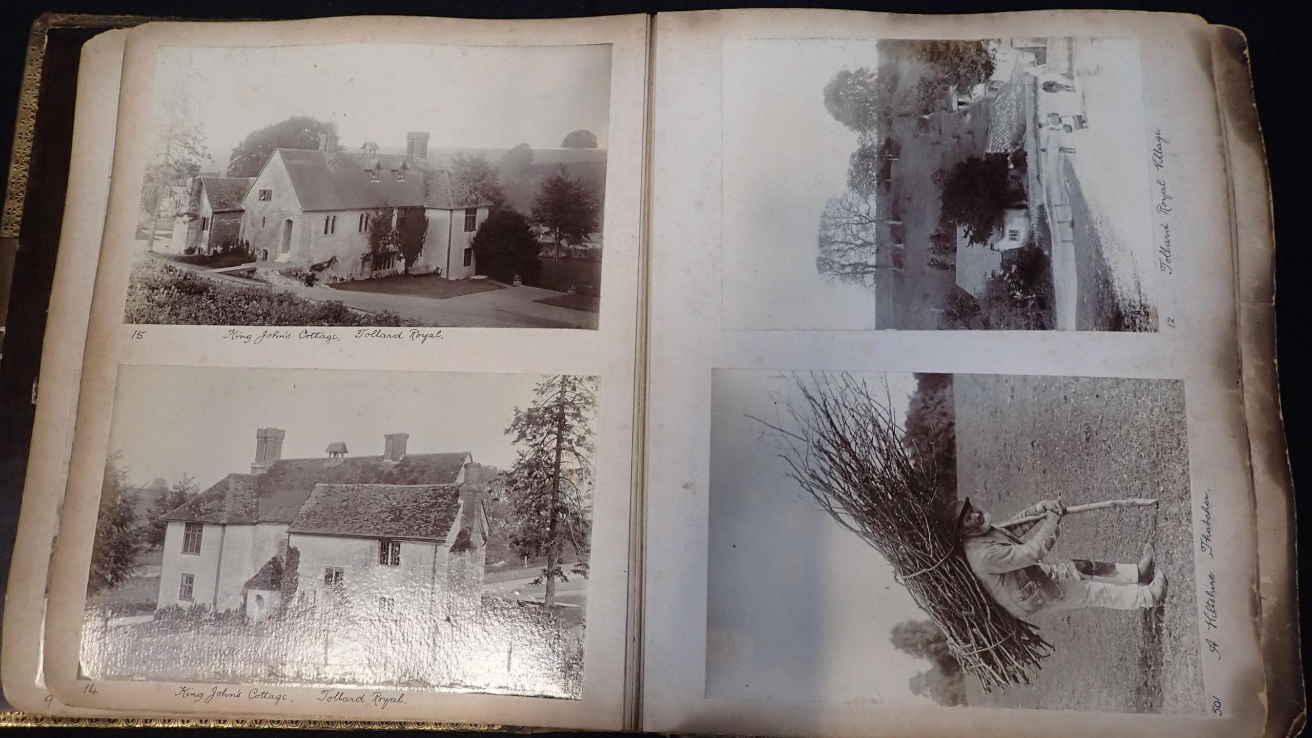 The open album showing four photos - three of houses and one of the thatcher.