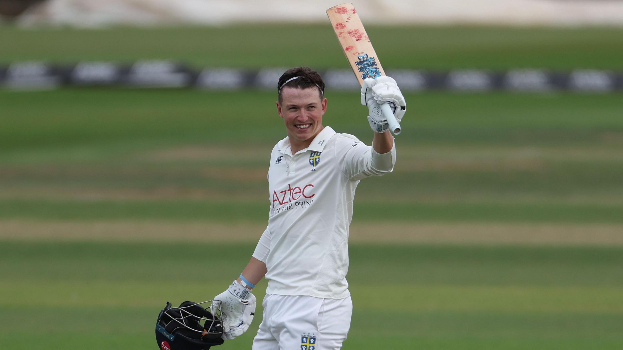 Ben McKinney celebrates his hundred