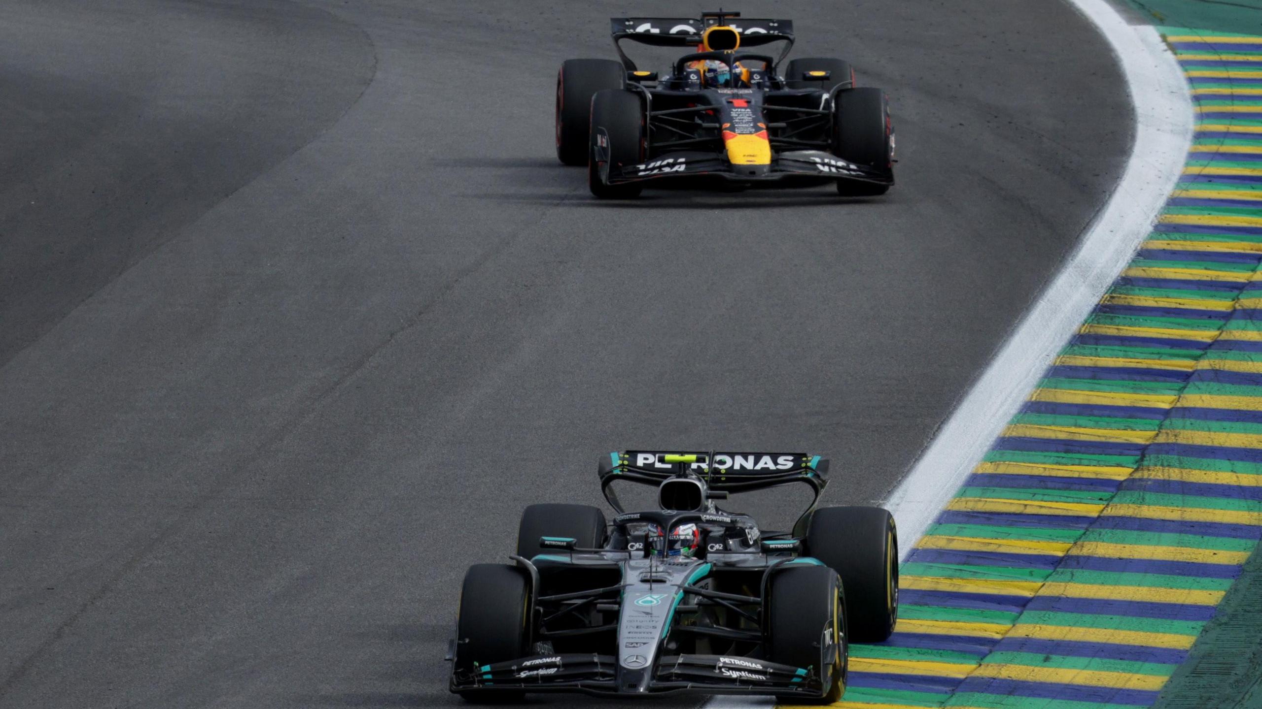 The Mercedes of Kimi Antonelli ahead of Red Bull's Max Verstappen during the closing stages of the Sao Paulo Grand Prix