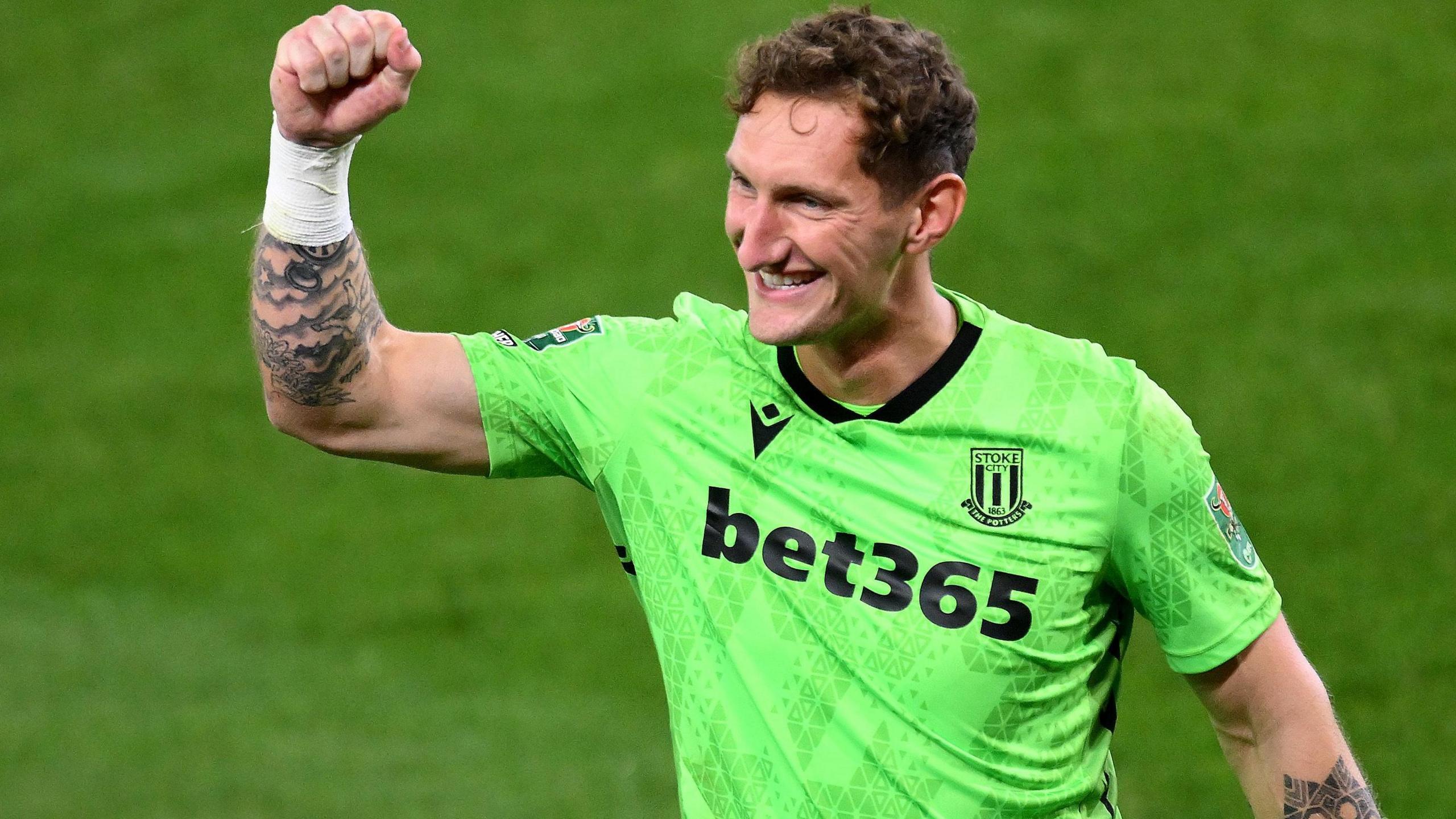 Jack Bonham of Stoke City celebrates victory in the penalty shootout