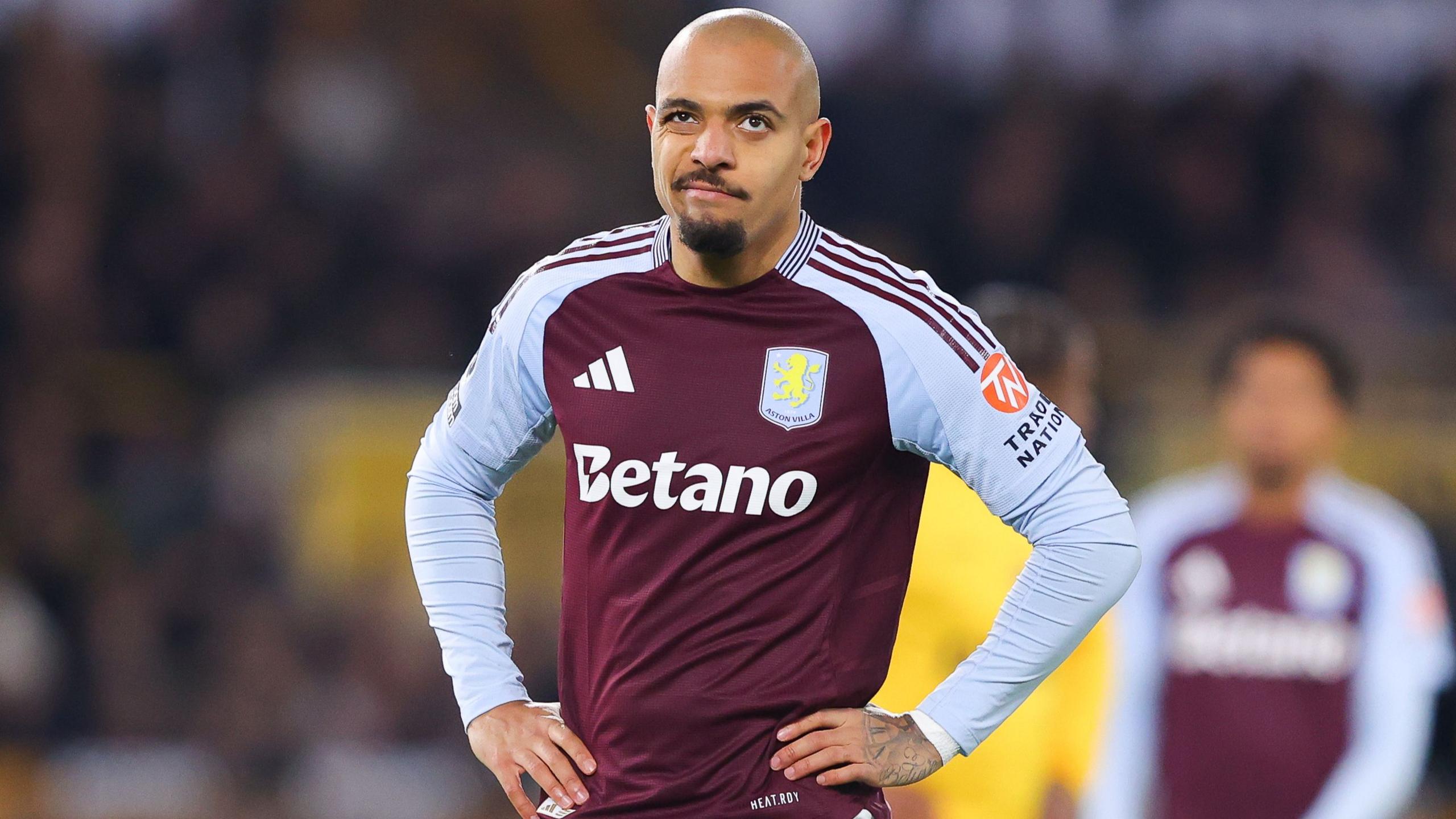 Aston VIlla's  Donyell Malen looks dejected during a Premier League match. 