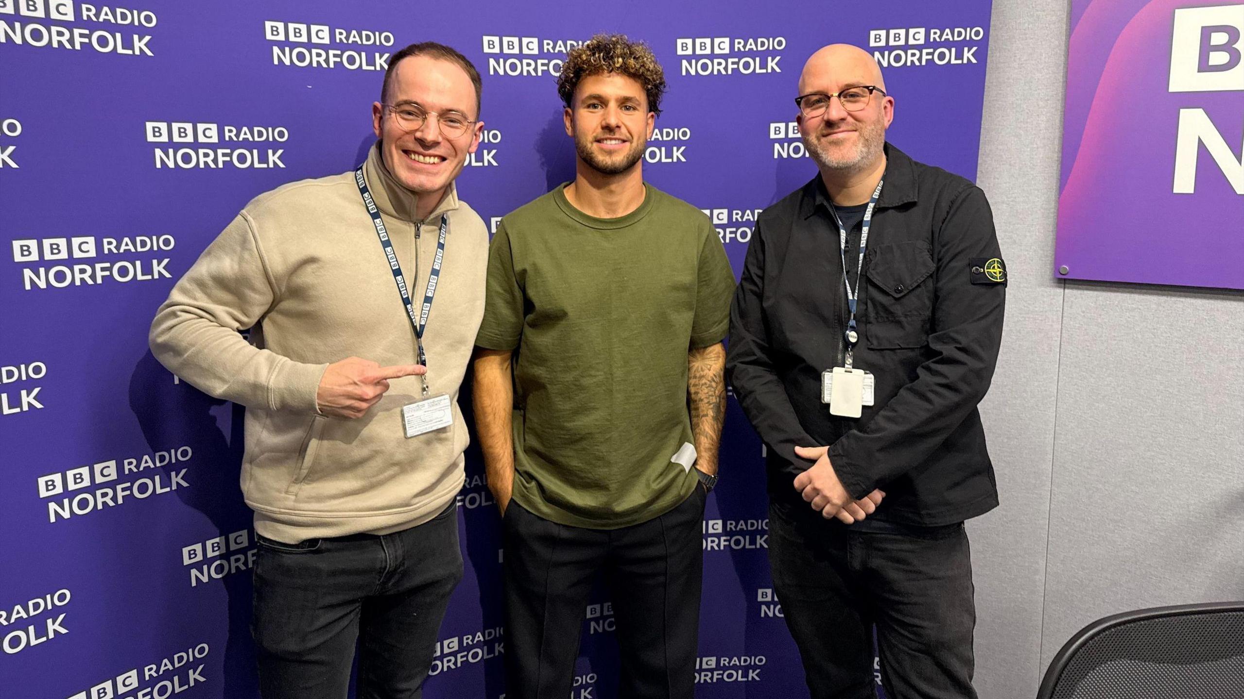 Norwich City's Emiliano Marcondes with BBC Radio Norfolk's Chris Reeve   and Rob Butler.