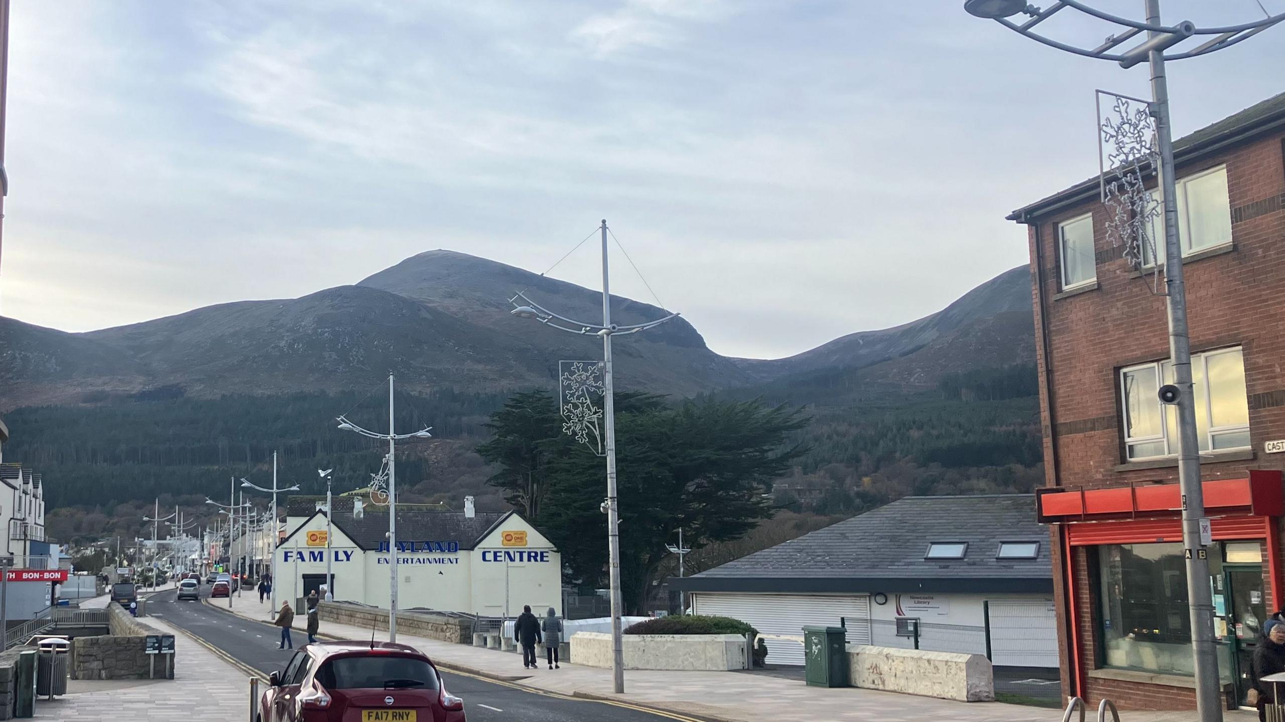 The Mourne mountains are visible from Newcastle's main street