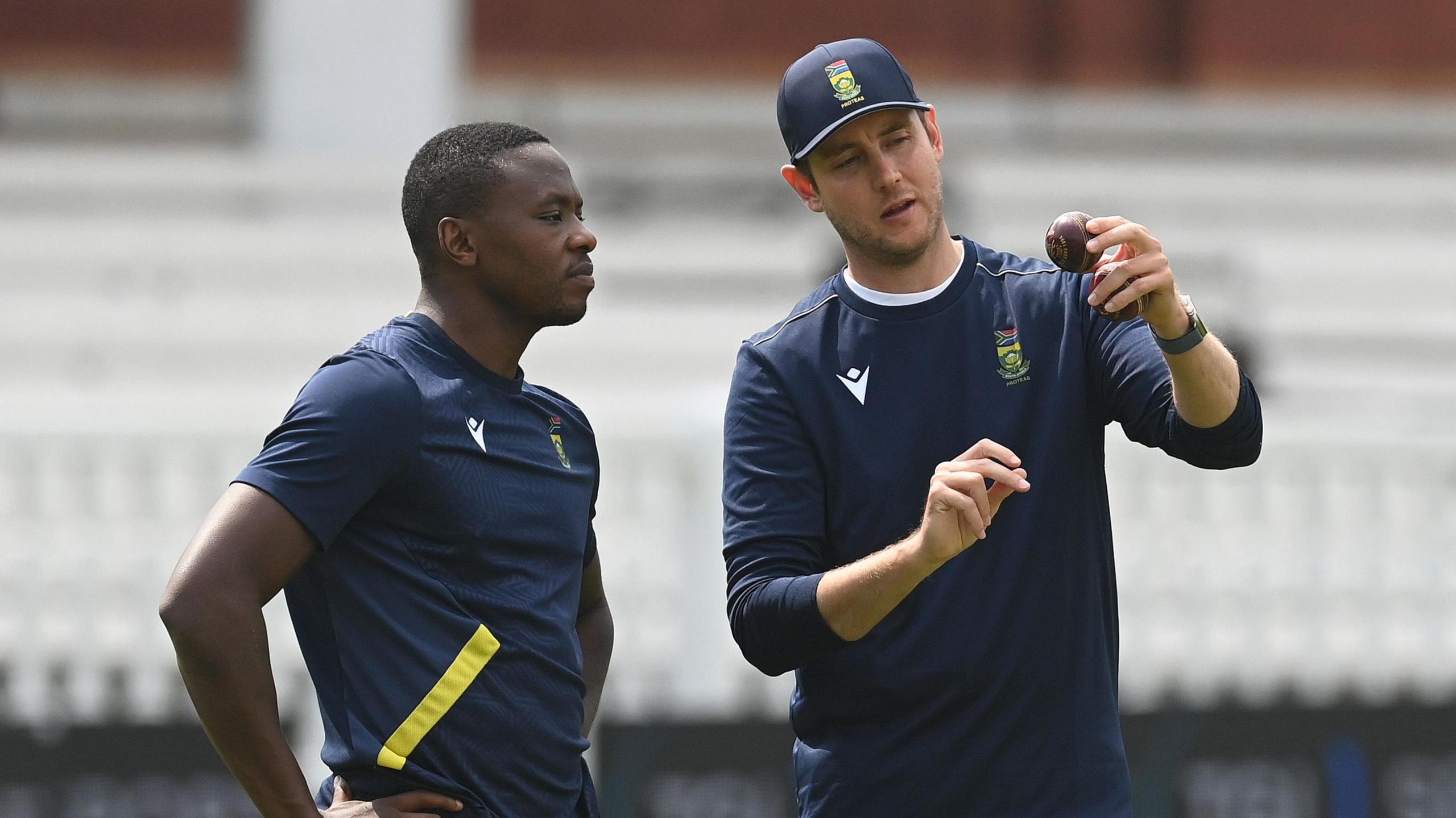 Former England fast bowler Stuart Broad at Lord's passing on bowling tips to South Africa quick Kasigo Rabada