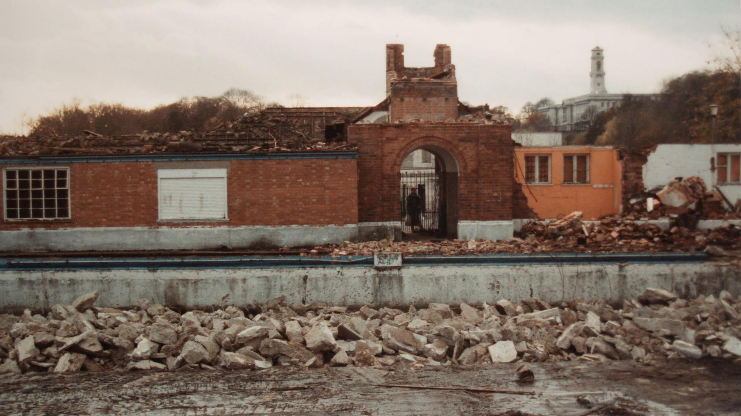 Derelict lido mid-demolition