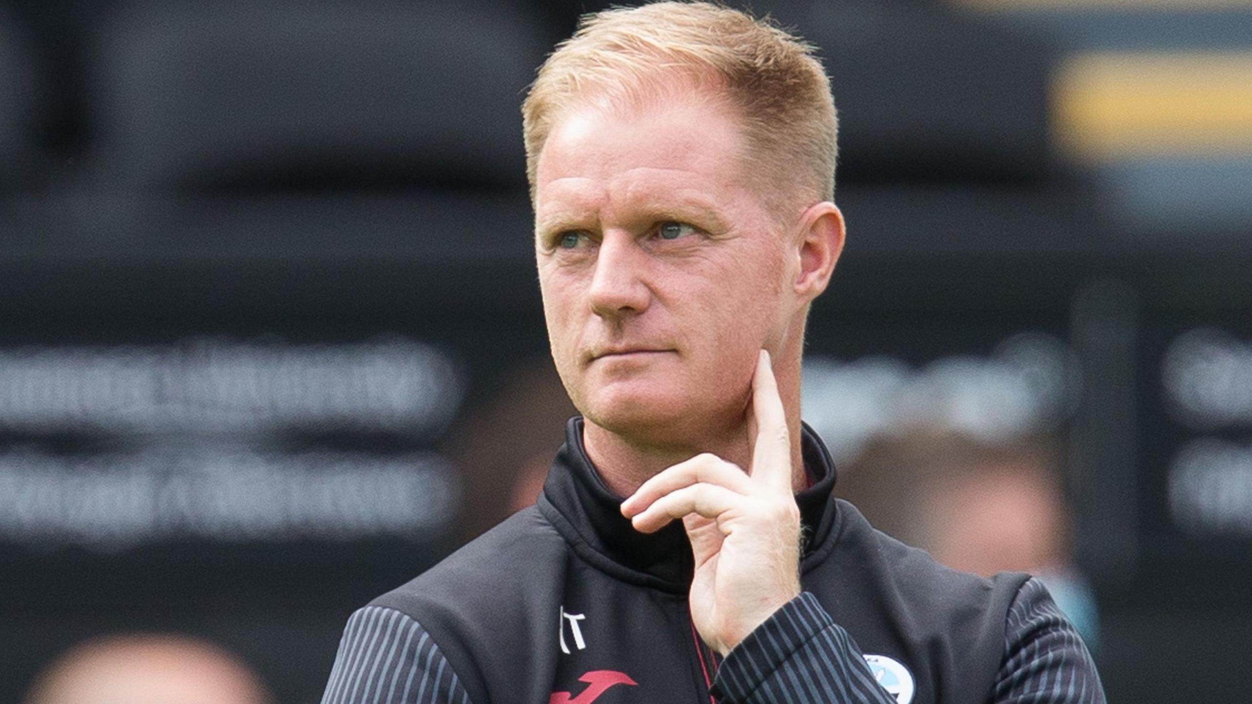 Alan Tate on the sideline during his coaching spell with Swansea