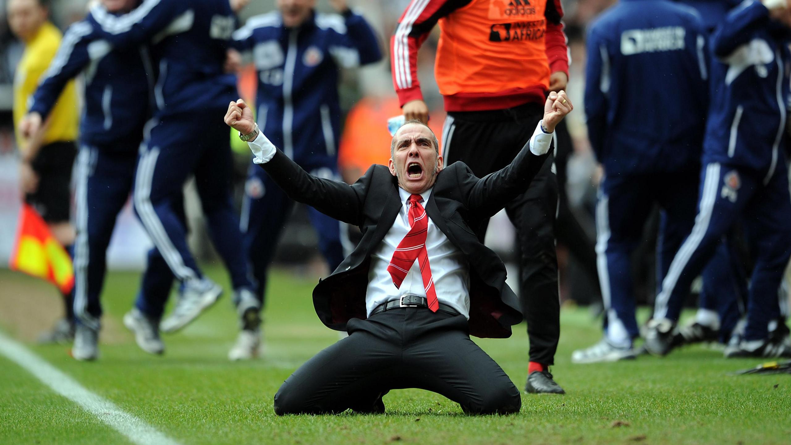 Manager Paolo Di Canio celebrates with a knee slide after Sunderland score at Newcastle in 2013