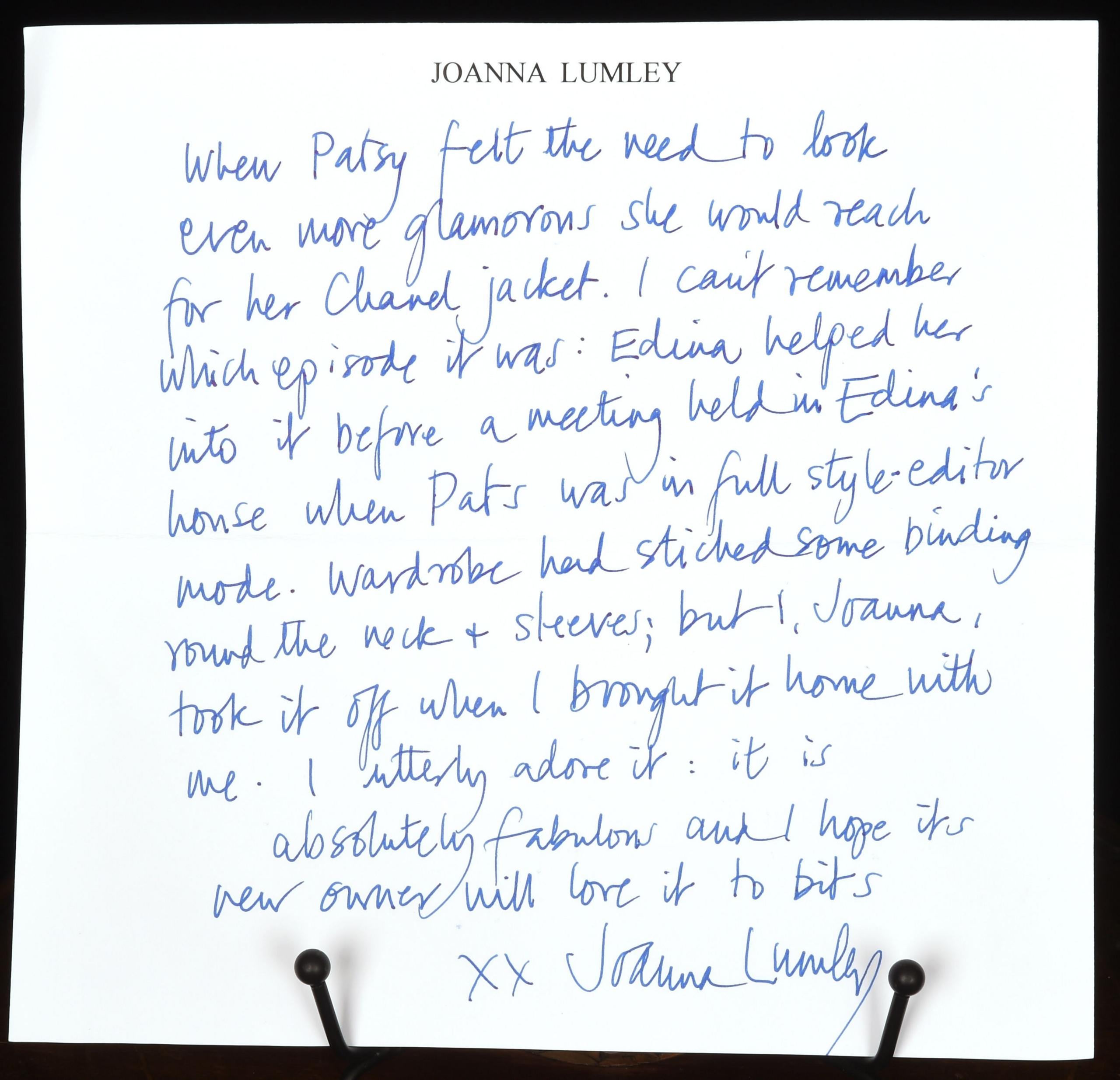 A handwritten note in blue from Joanna Lumley describes the jacket