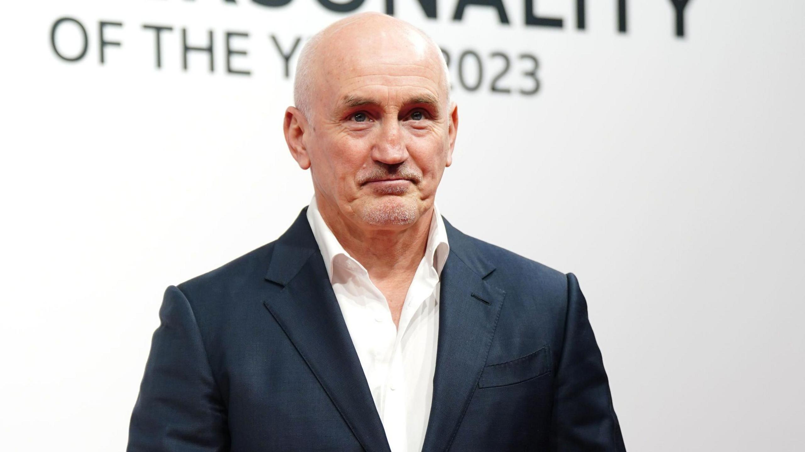 Barry McGuigan in a suit