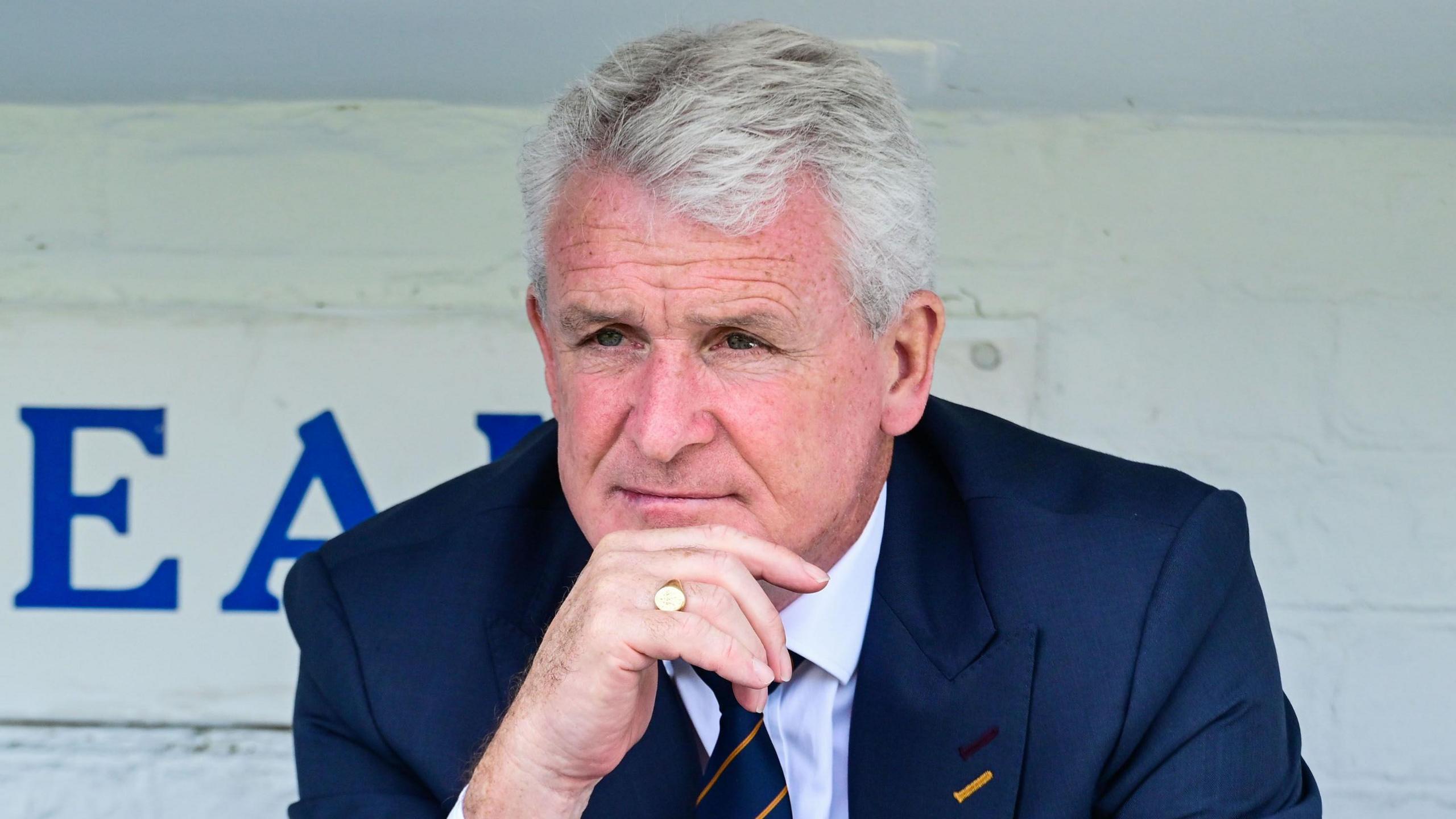 Mark Hughes in the dugout at Carlisle's Brunton Park