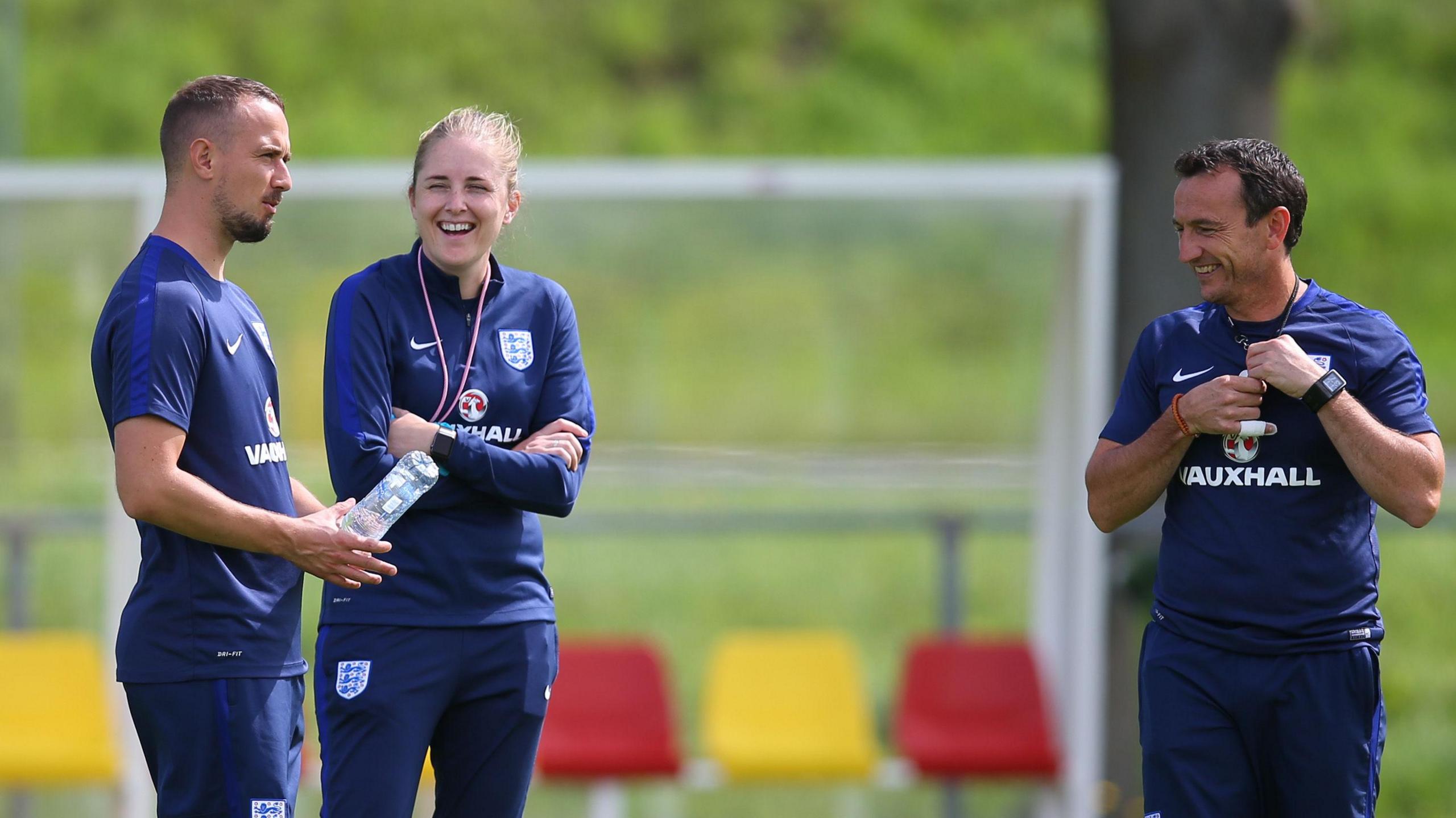 Gemma Grainger alongside former England boss Mark Sampson (left)