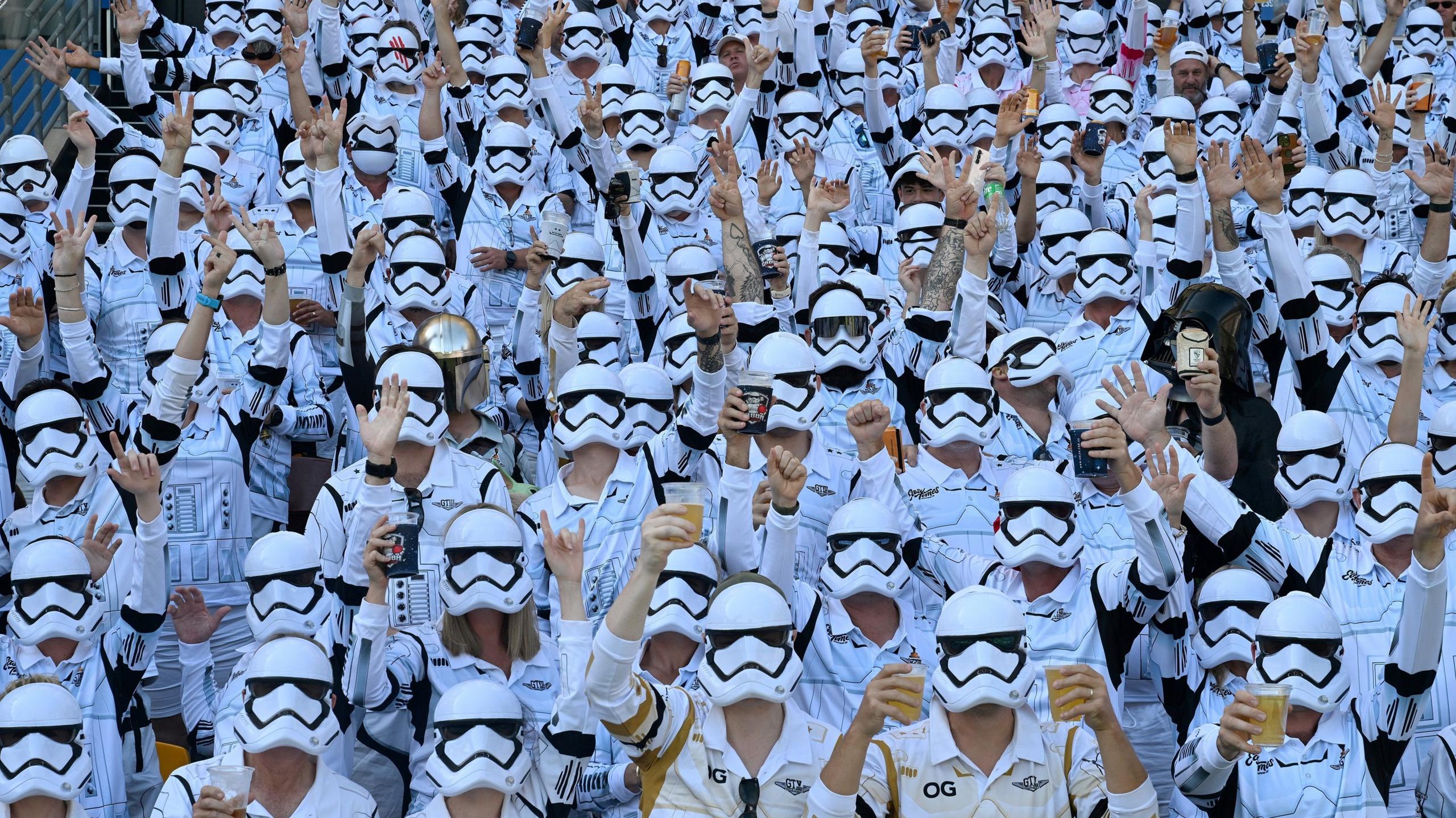 Spectators dressed as stormtroopers