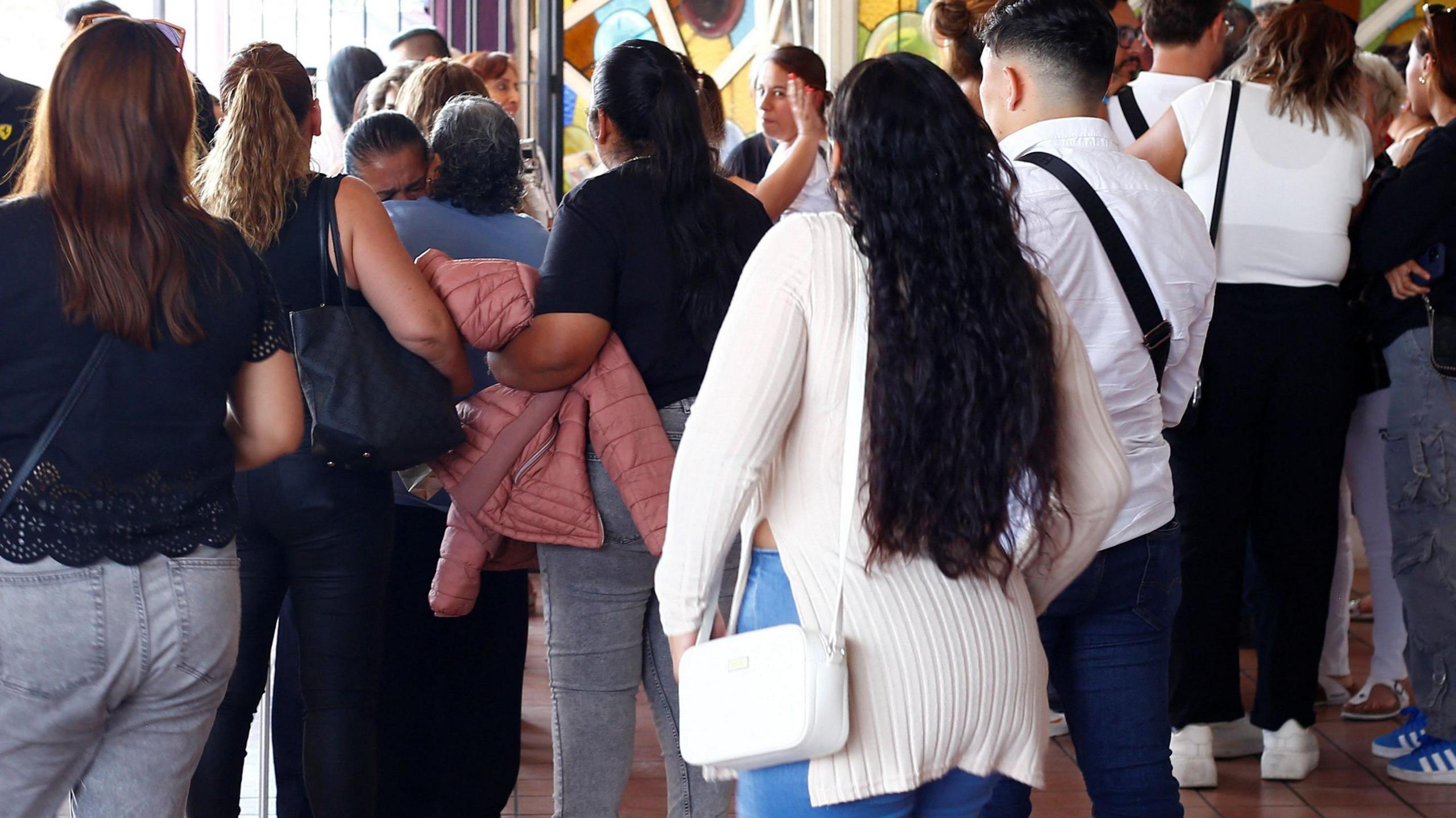 Backs of a crowd of people