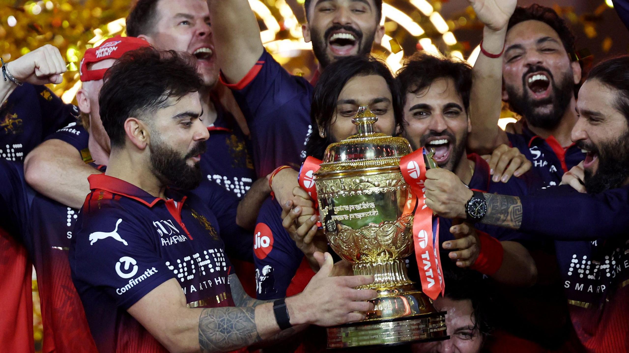Virat Kohli with the IPL trophy