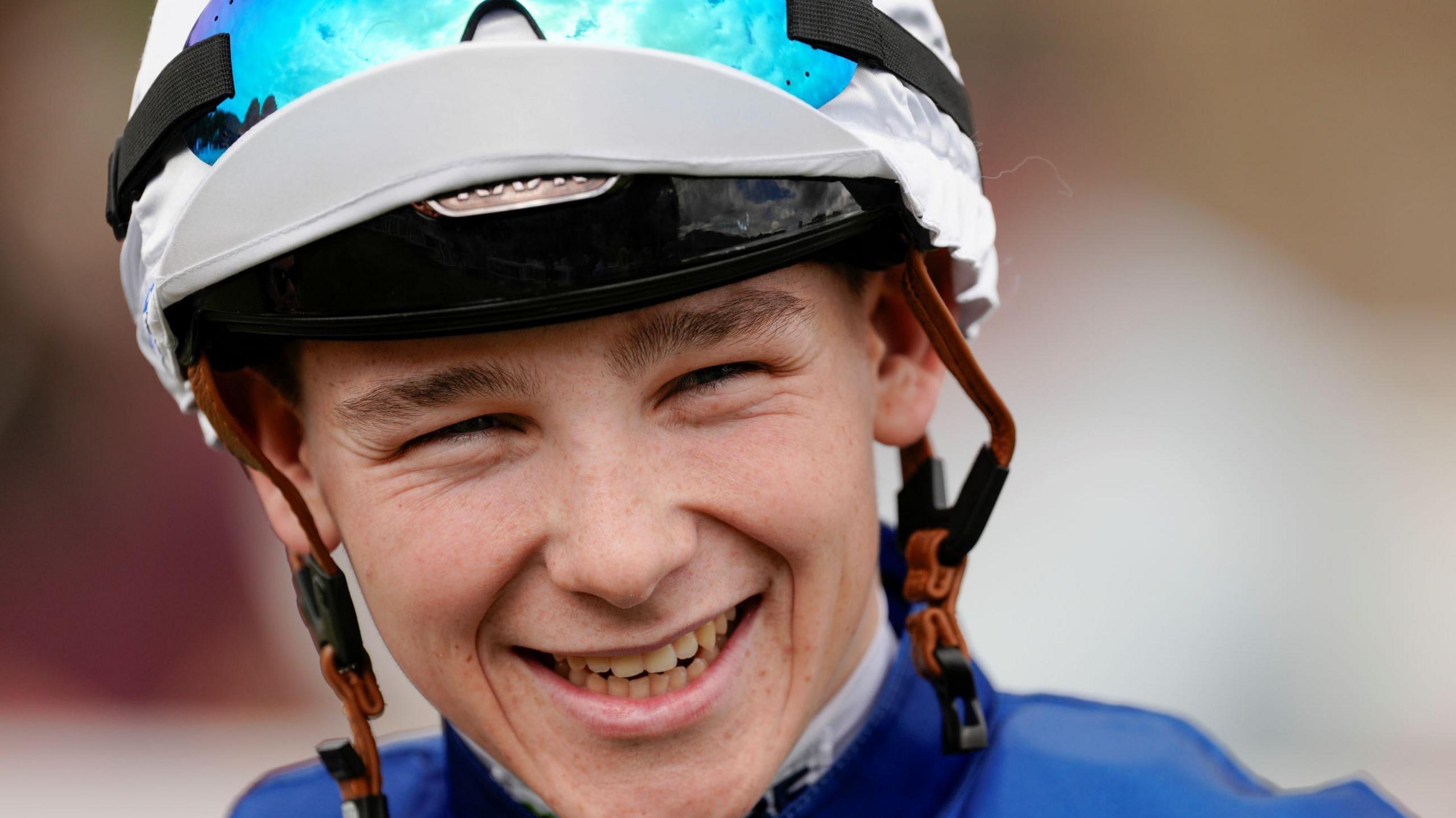 Jockey Billy Loughnane smiles 