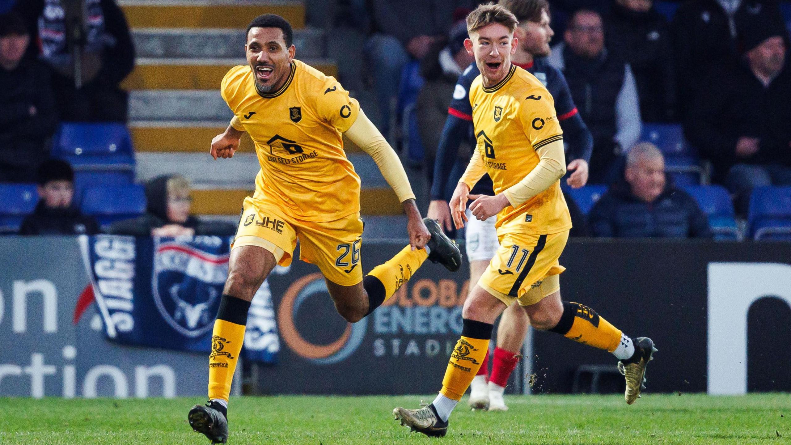Livingston's Cristian Montano and Robbie Fraser celebrate