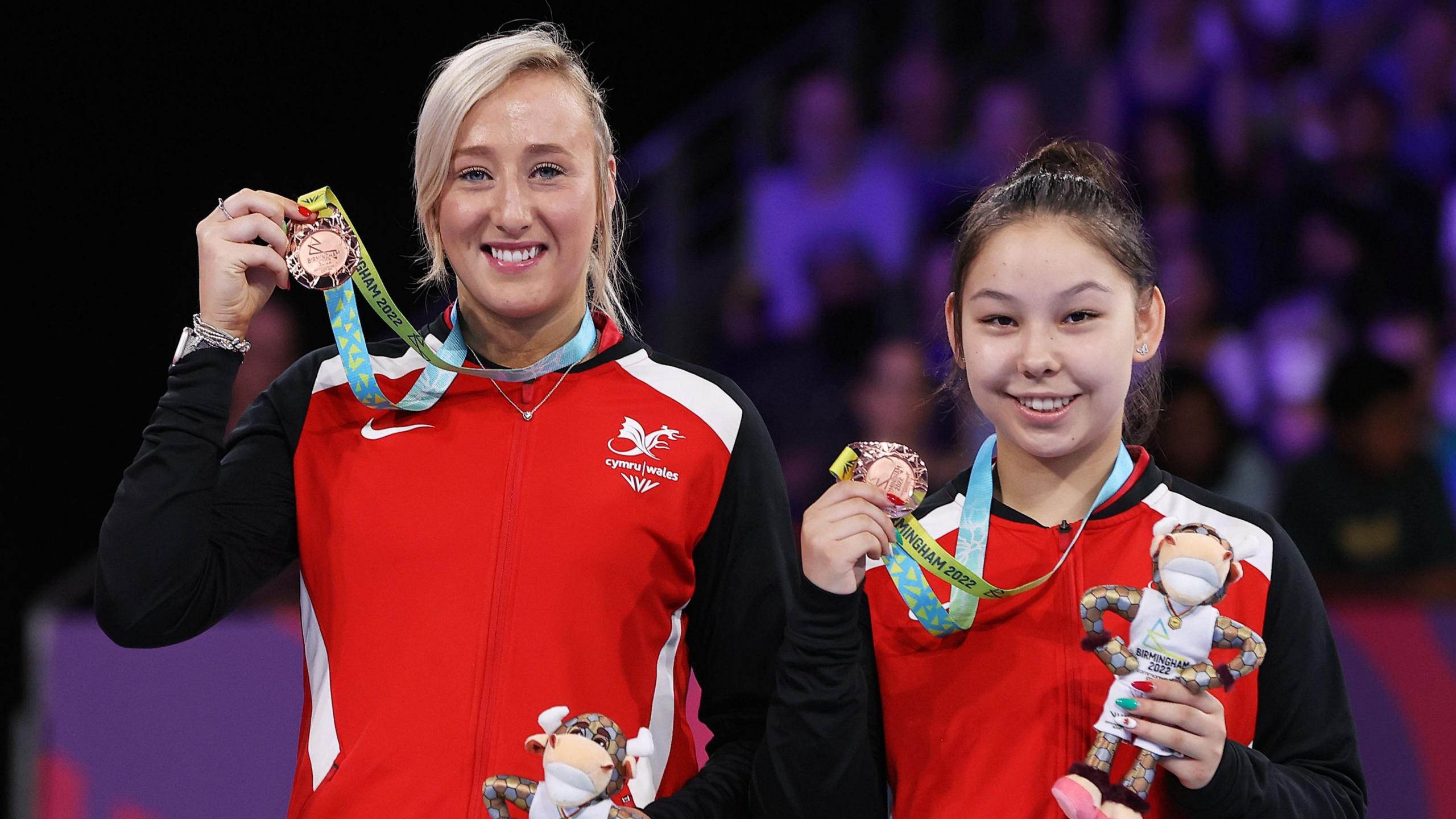 Bronze Medallists Charlotte Carey and Anna Hursey of Team Wales celebrate during the Table Tennis Women's Doubles Medal Ceremony on day eleven of the Birmingham 2022 Commonwealth Games 