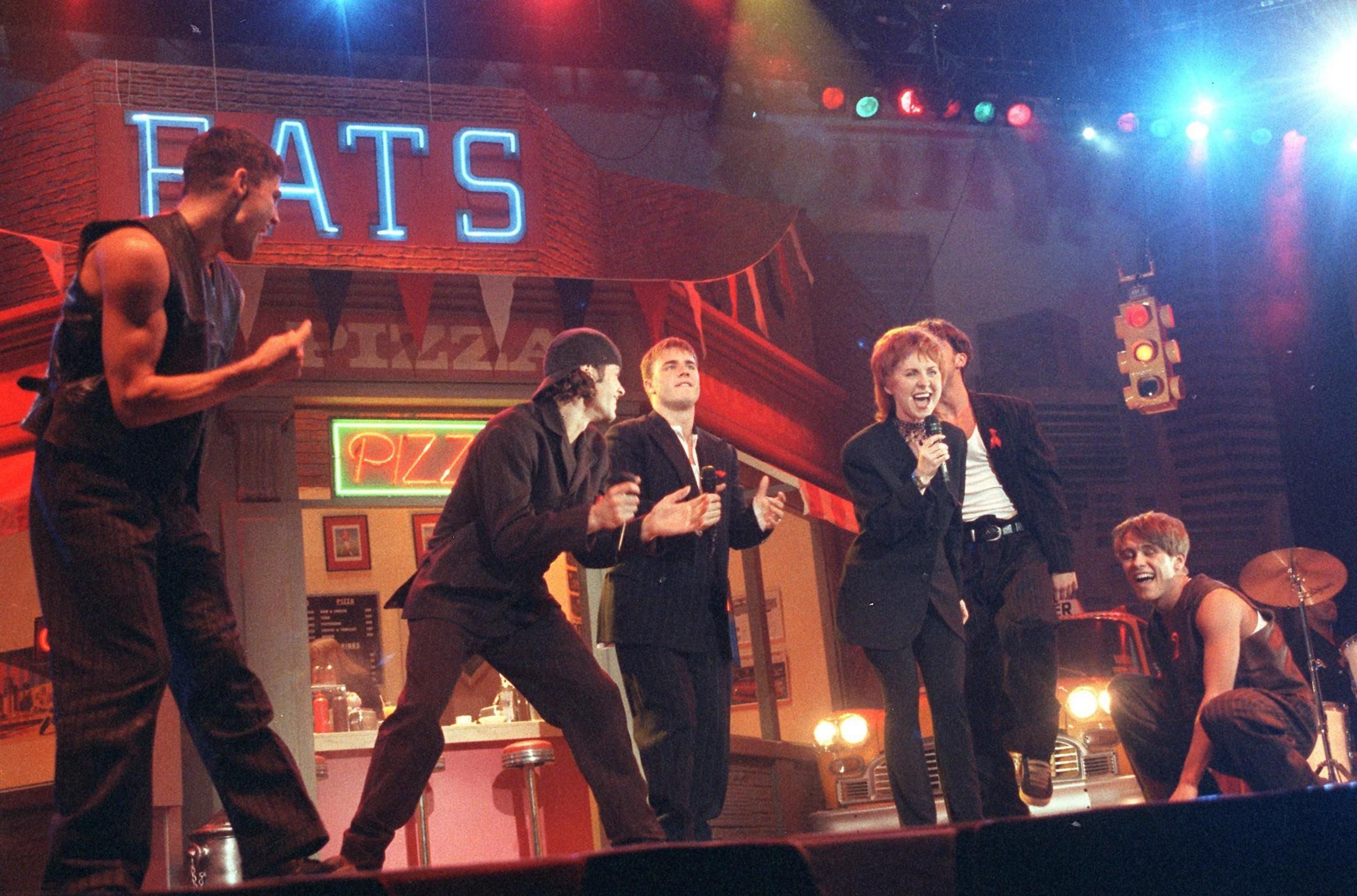 Lulu performs with Take That 