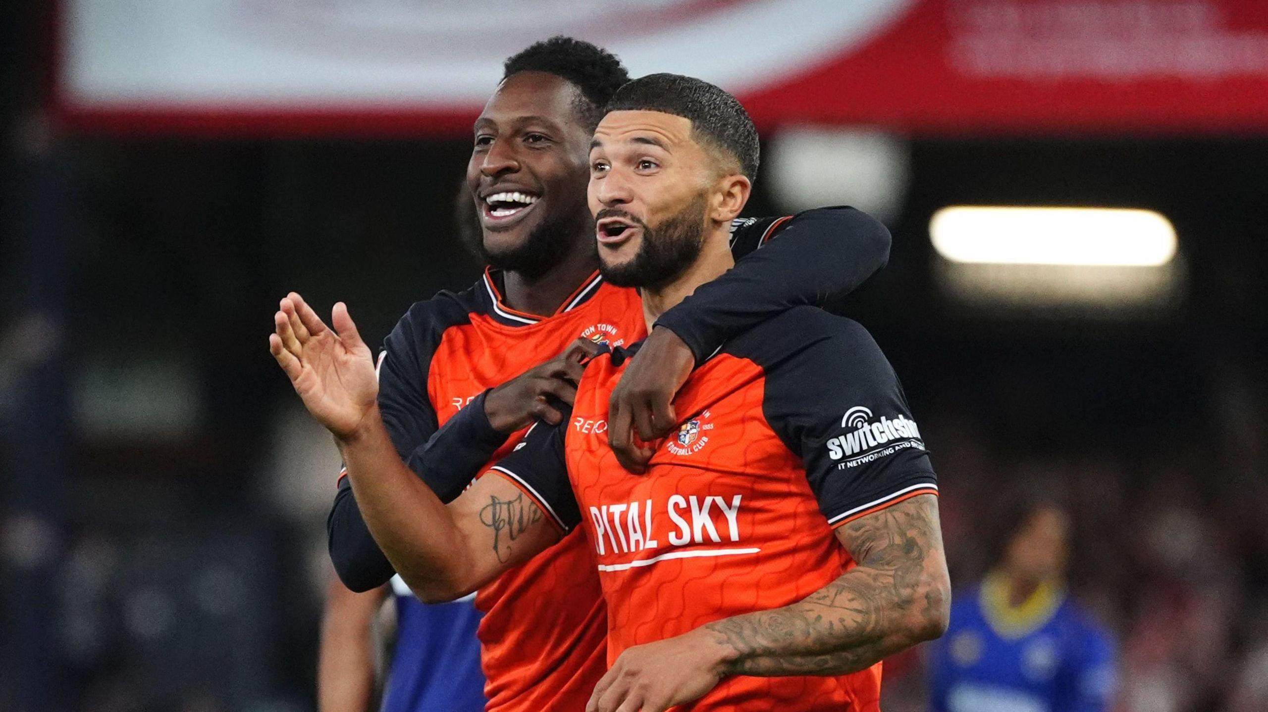 Luton Town's Nahki Wells (right) and Shandon Baptiste celebrate