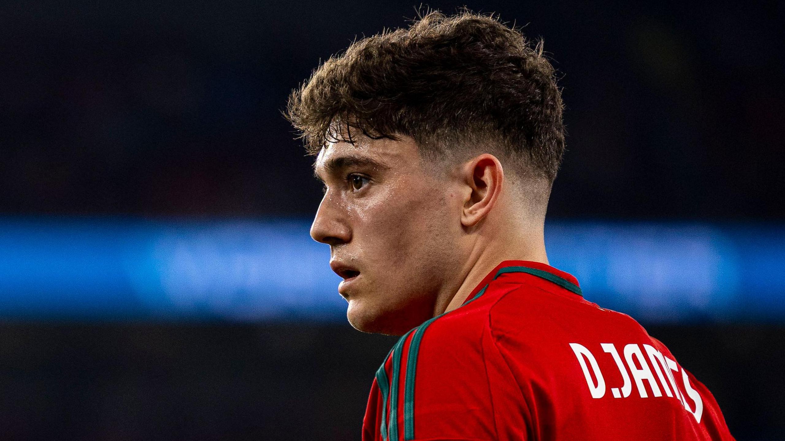 Dan James looks on during a Wales game