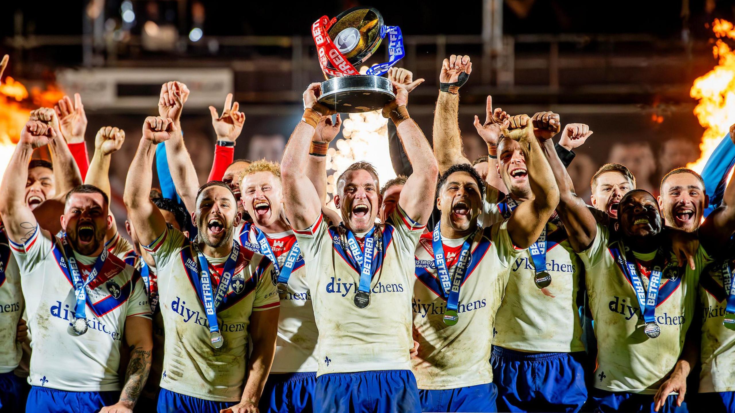 Wakefield Trinity celebrate winning the Championship Grand Final