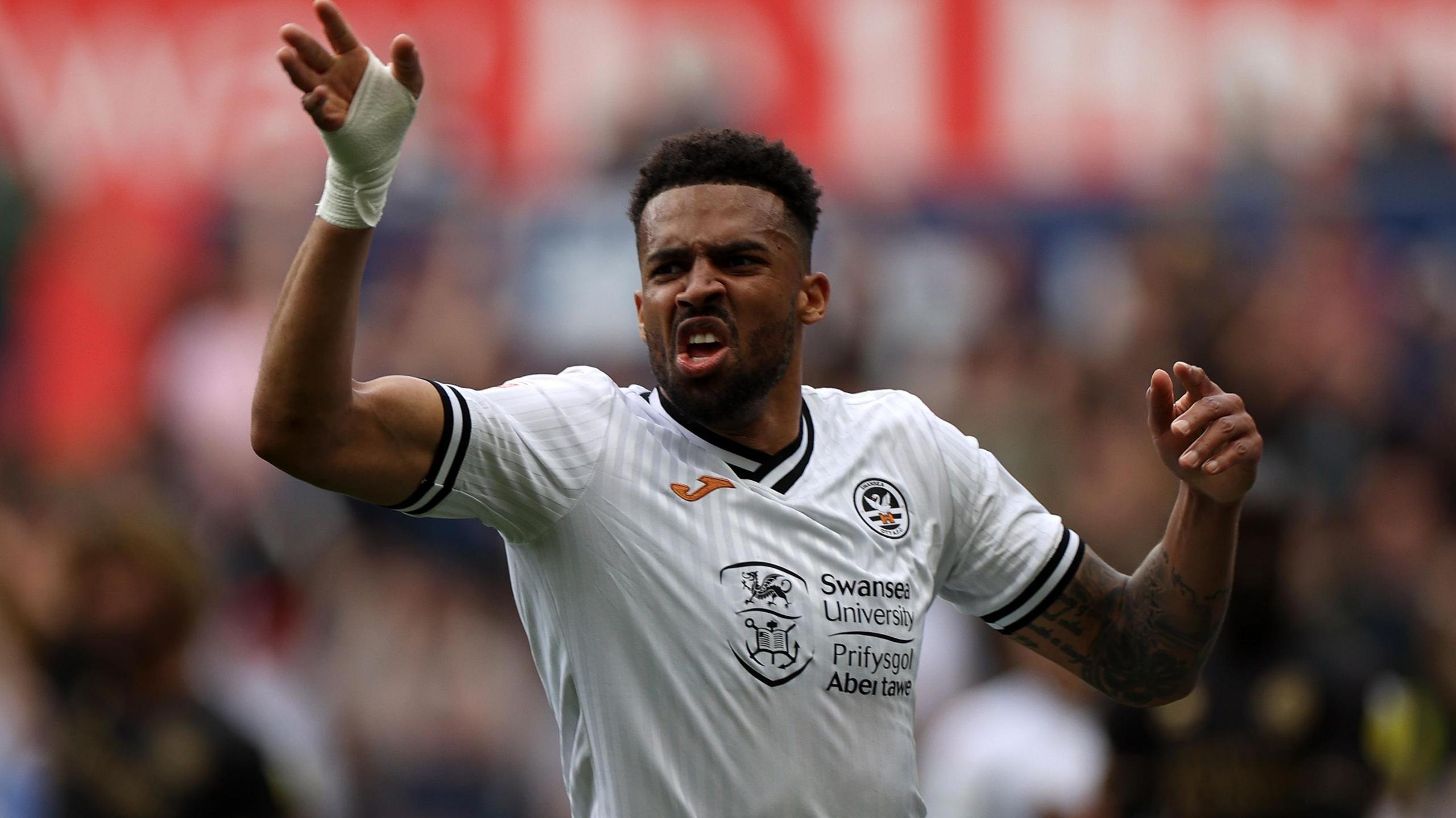 Cyrus Christie during his loan spell at Swansea