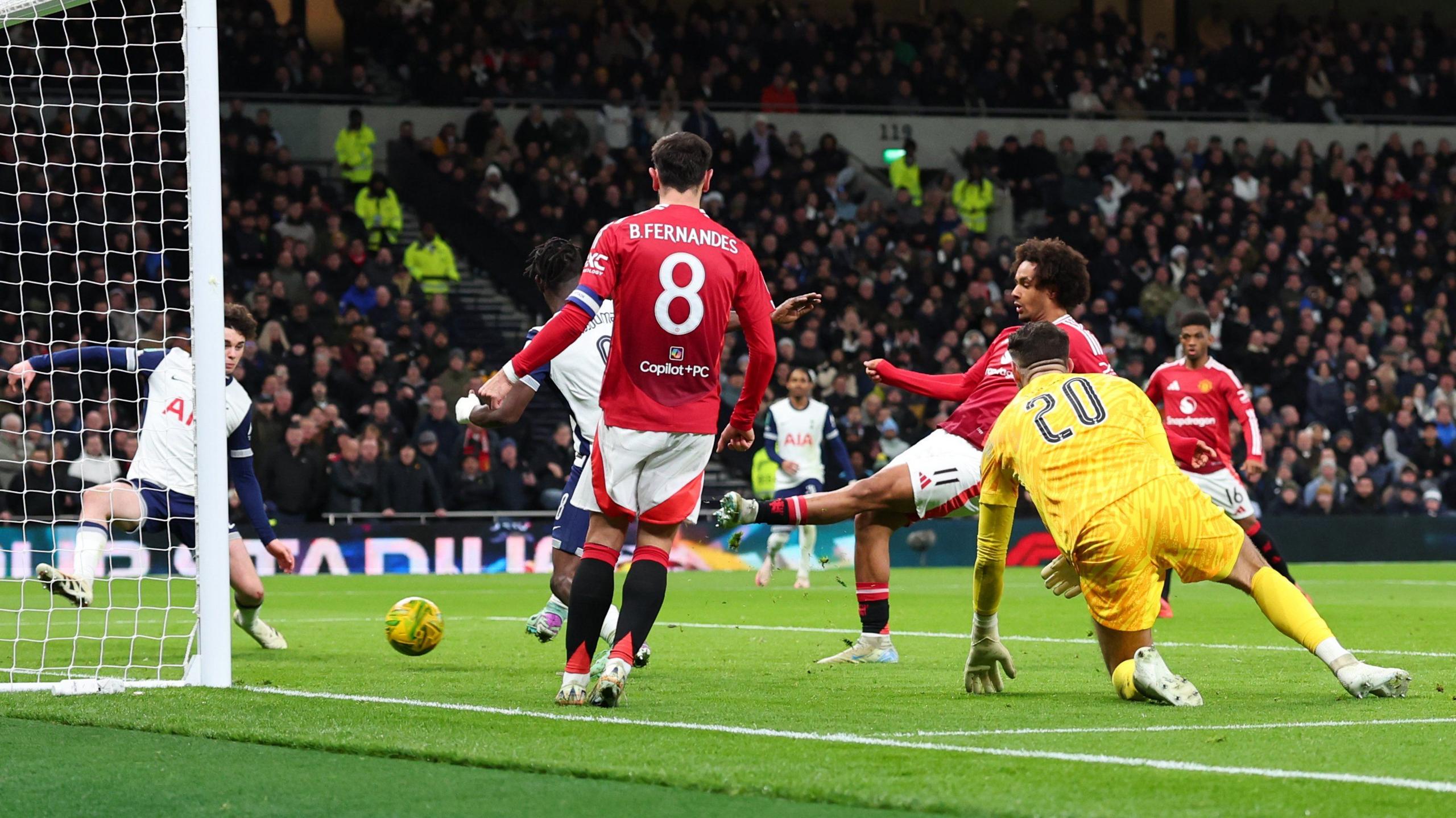 Tottenham goalkeeper Fraser Forster watches as Joshua Zirkzee taps in from close range for Manchester United